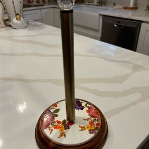 Mackenzie-Childs white flower wood paper towel holder.